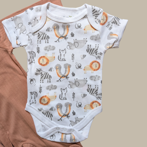 A white short-sleeve baby bodysuit with an all-over playful animal print featuring lions, zebras, insects and elephants in grey, orange, and black.
