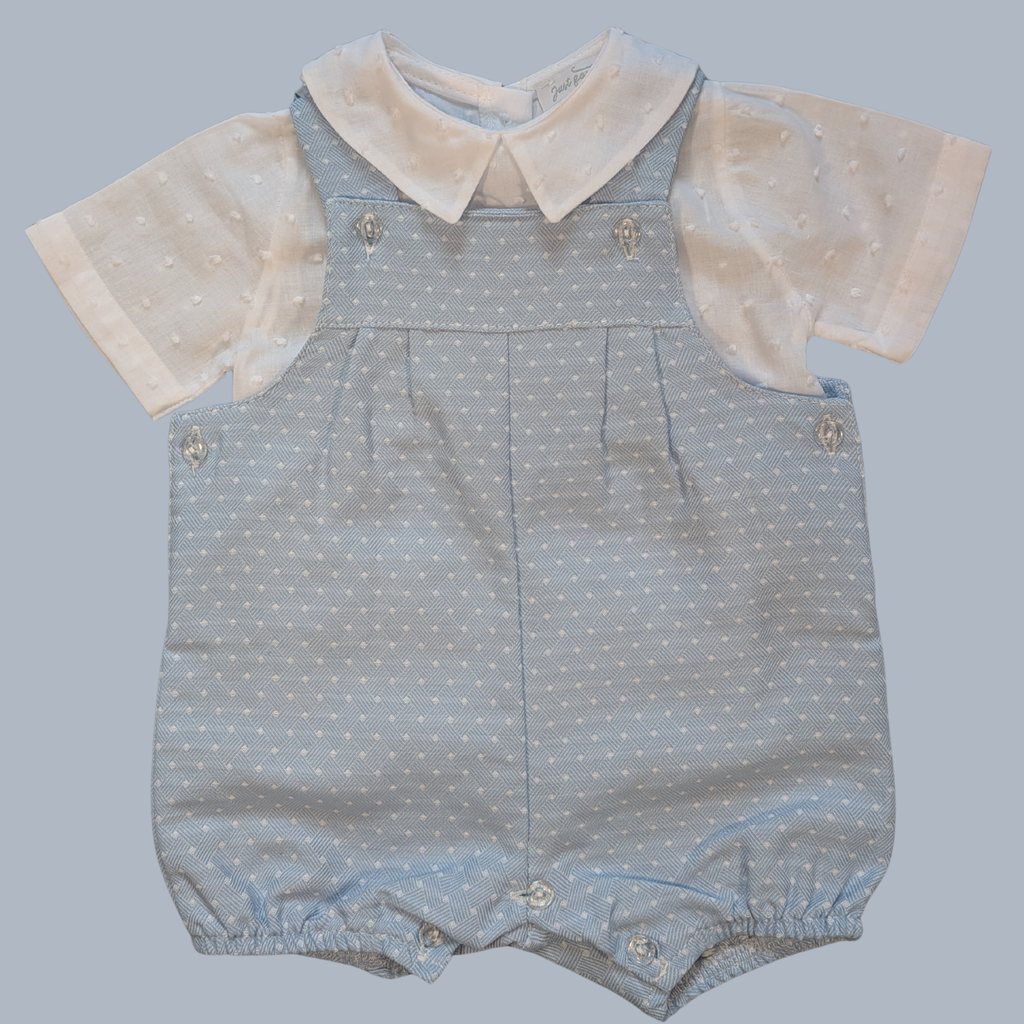 Baby romper with short sleeves and a collar on a light gray background