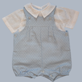 Baby romper with short sleeves and a collar on a light gray background