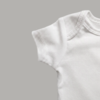 White cotton short-sleeve baby bodysuit sleeve