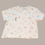 Baby shirt with animal pattern on a gray background