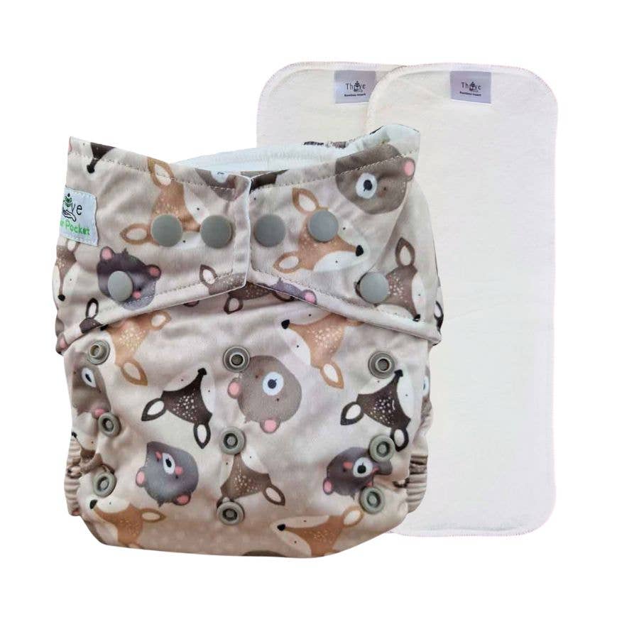 Baby cloth diaper with animal pattern and white insert on a white background